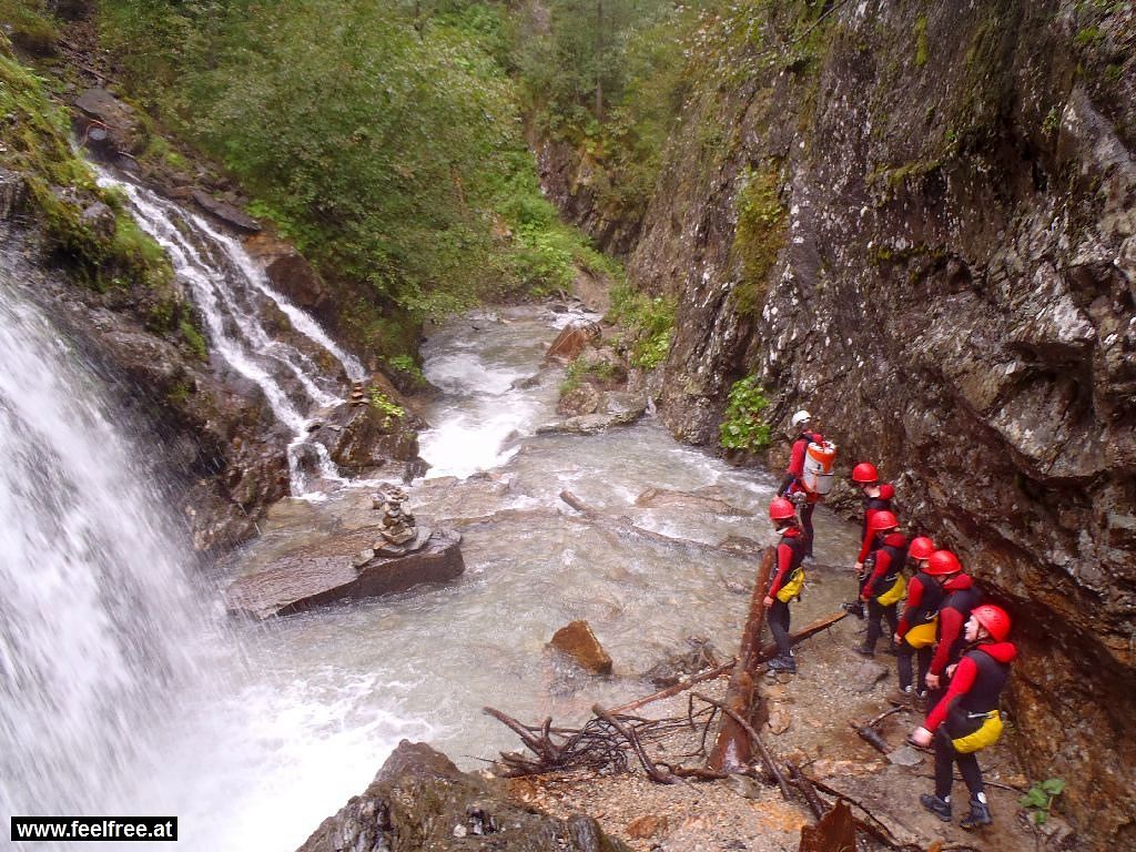 Canyoning with waterfall.