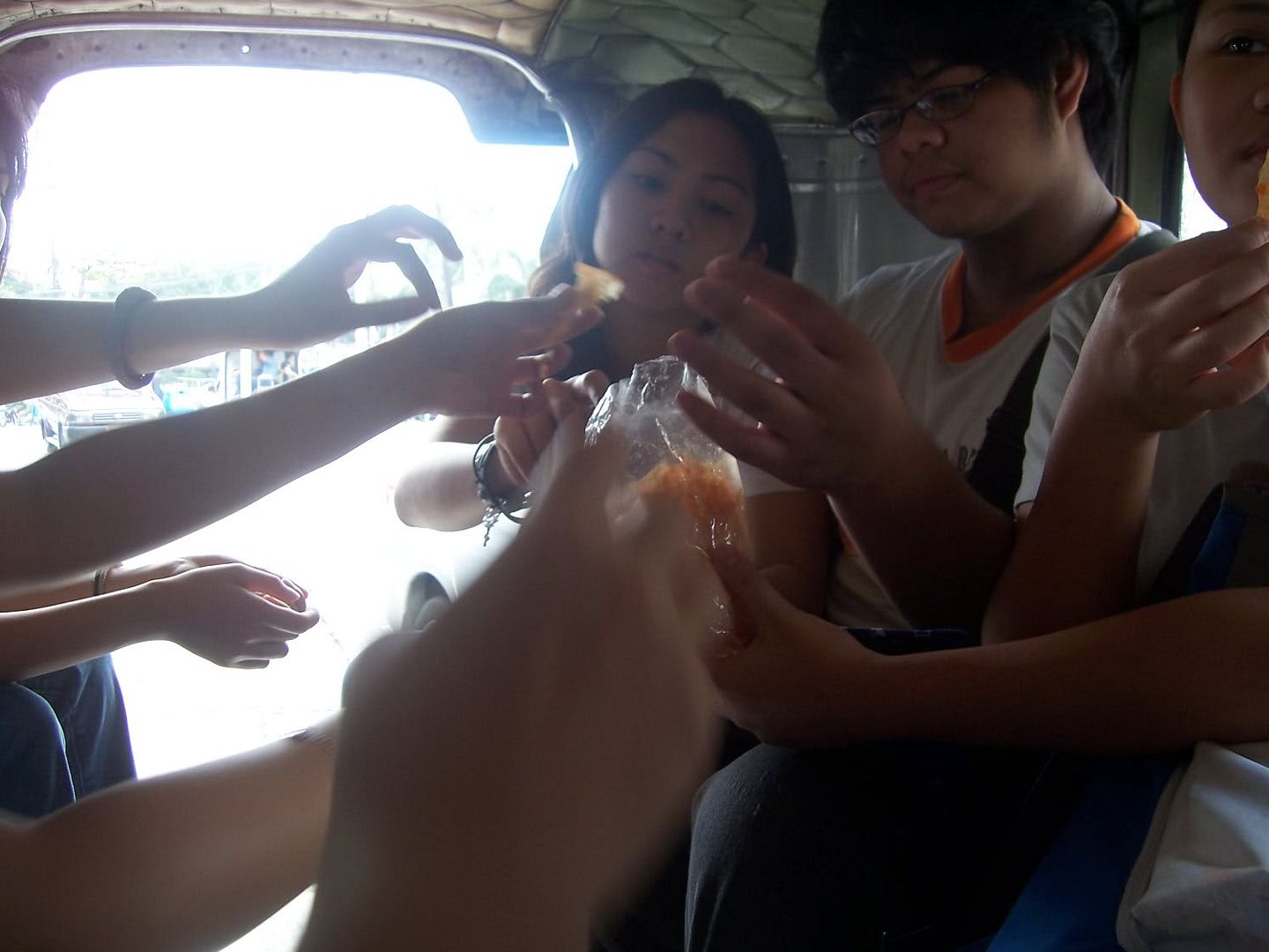 Finally going home, we play with the camera (or at least I did) and they ate some chips, apparently brought from within. I thought it was a mix of pre-manufacutred stuff, but Marcia thought it was cassava chips added with cheese powder.