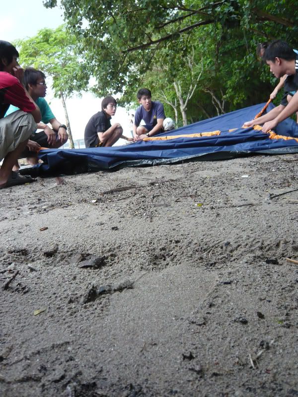 Tent people hard at work.