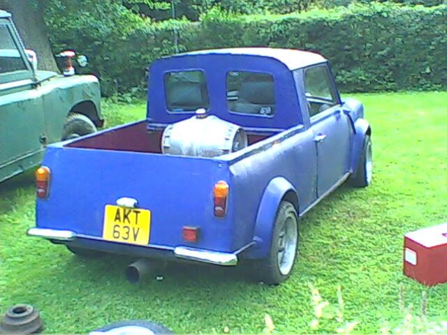 Its a mini clubman estate turned into a pick-up with a austin maxi 1750cc 