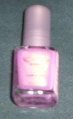 This nail polish is brand new still has price sticker. It looks very pink
in the picture, but it's really more of a lavender opalescent color. I got it at Icing,
never used it. - retails for 2.50 - $2.00