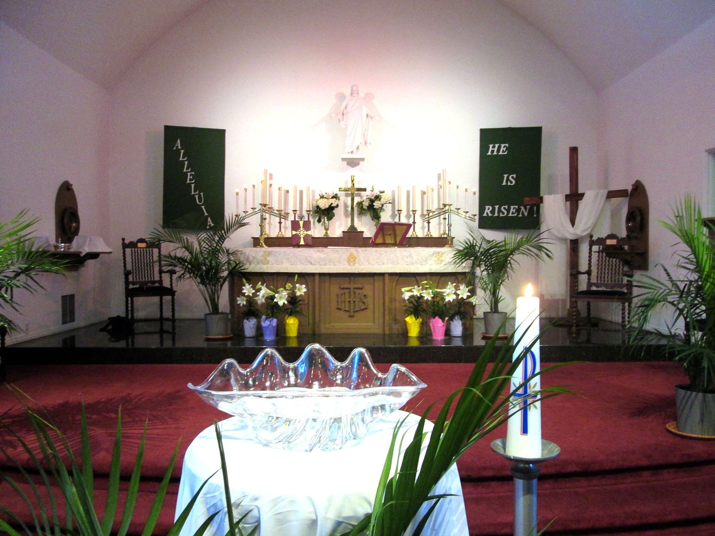easter chancel flowers and baptismal font