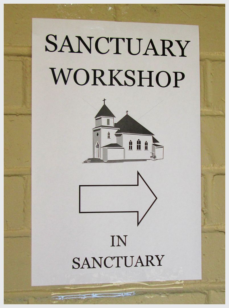 immigration sanctuary workshop sign