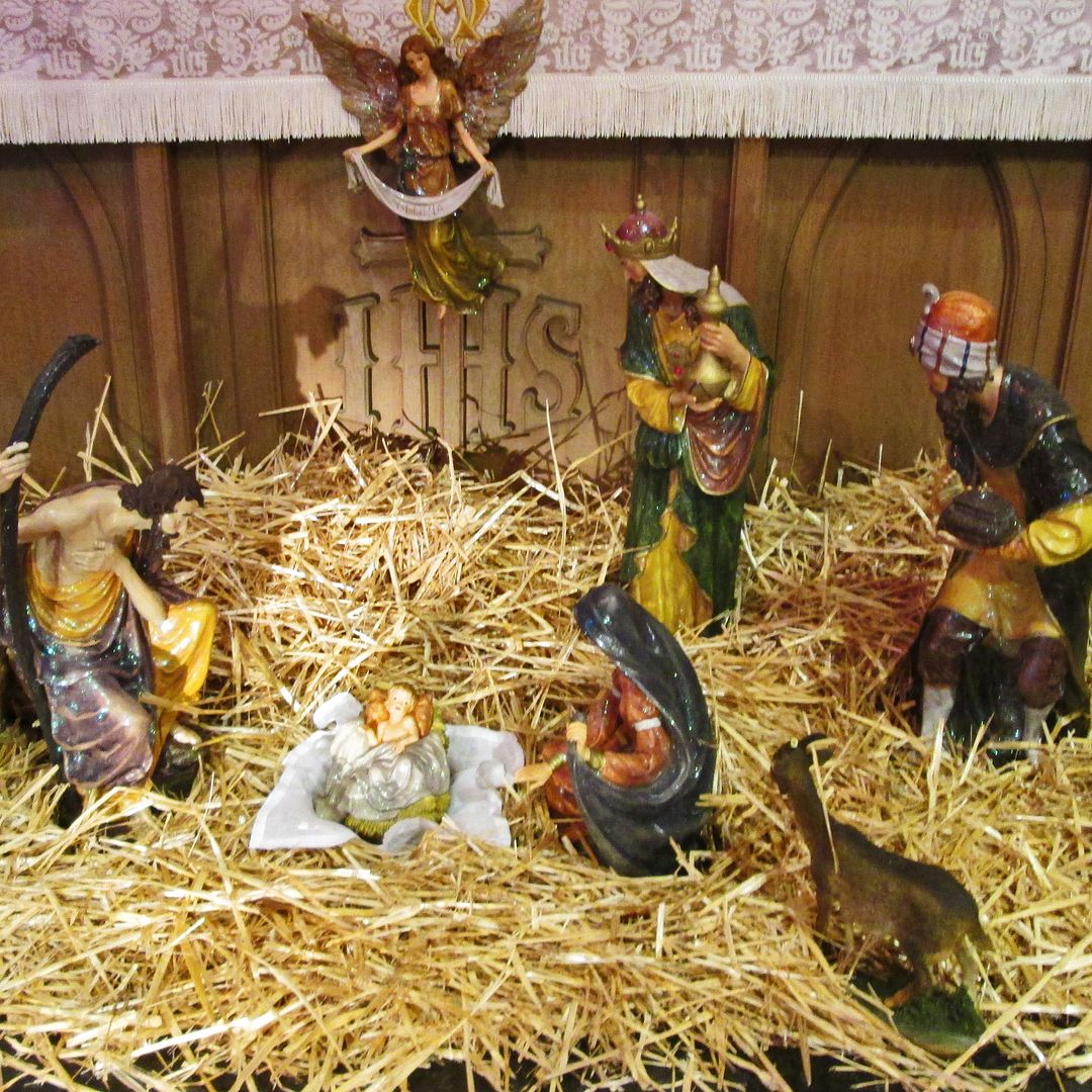 picture may contain Crèche, angel, wise men nativity scene