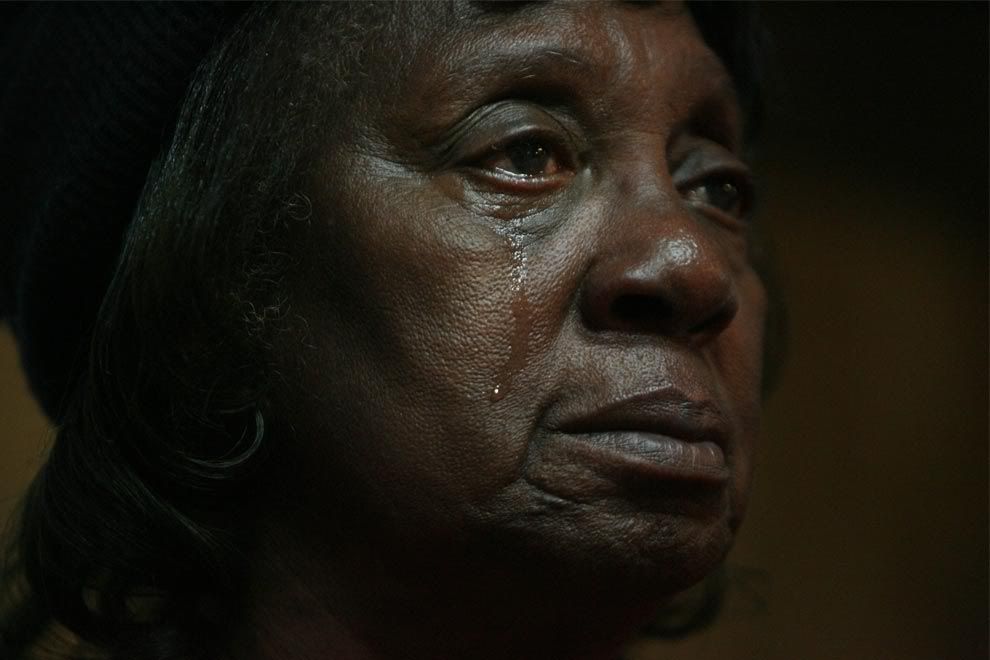 This woman sheds tears of joy after watching on television Barack H. Obama become the first African-American U.S. president.