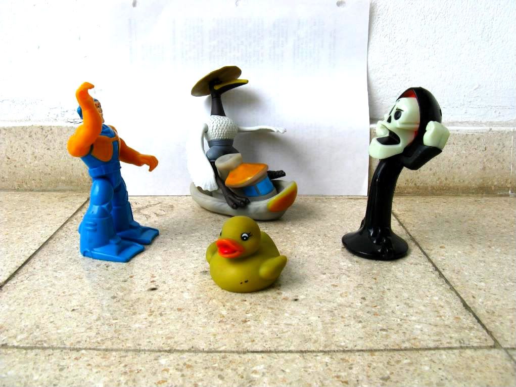A set up of several plastic toys from Abdiels Happy Meals collection.