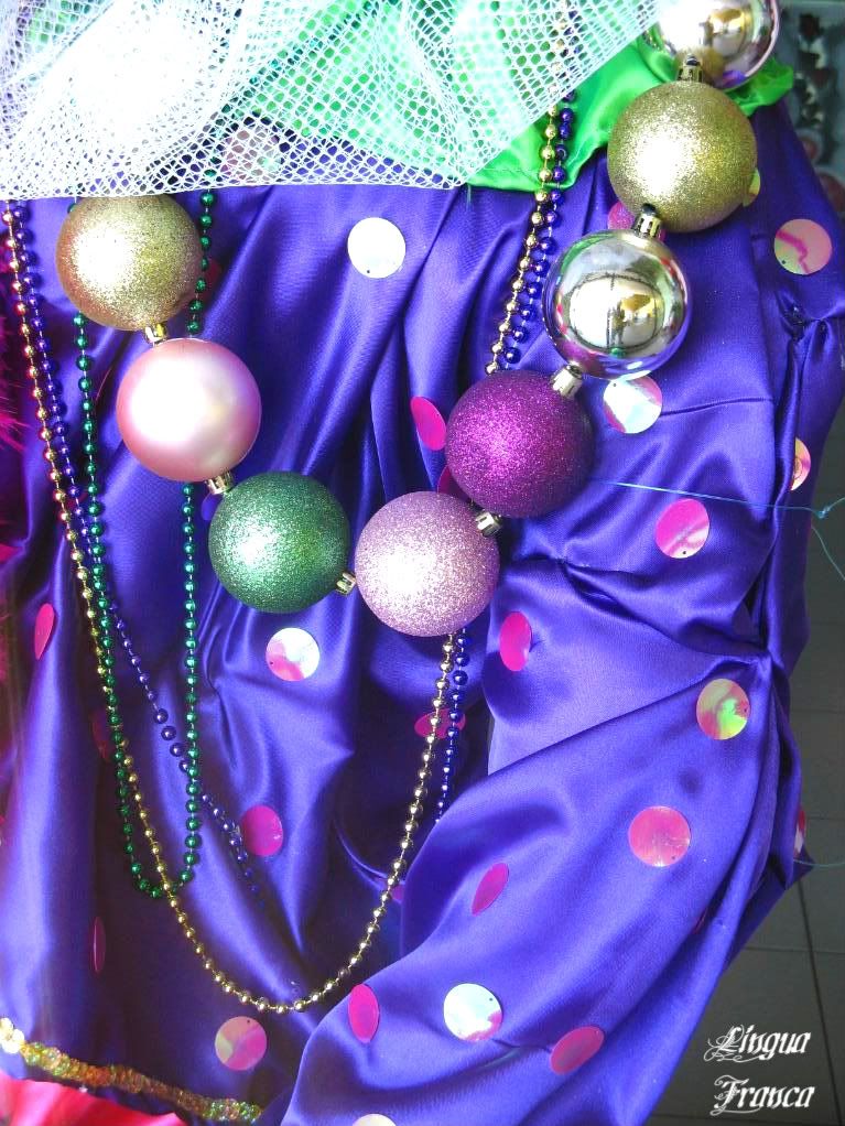 This picture shows the details of her necklaces. If you look closely, you will see me reflected on one of the beads of the necklace. (Credit: Omar Upegui R.)