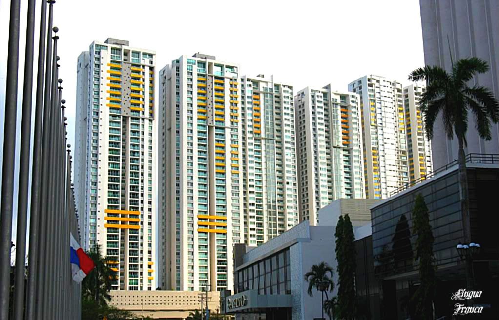 Photograph of a complex of buildings forming a wall beside the Sheraton Panama Hotel & Convention Center in Panama City, Panama. On the other side of these buildings is Panama Bay. (Credit: Omar Upegui R.)