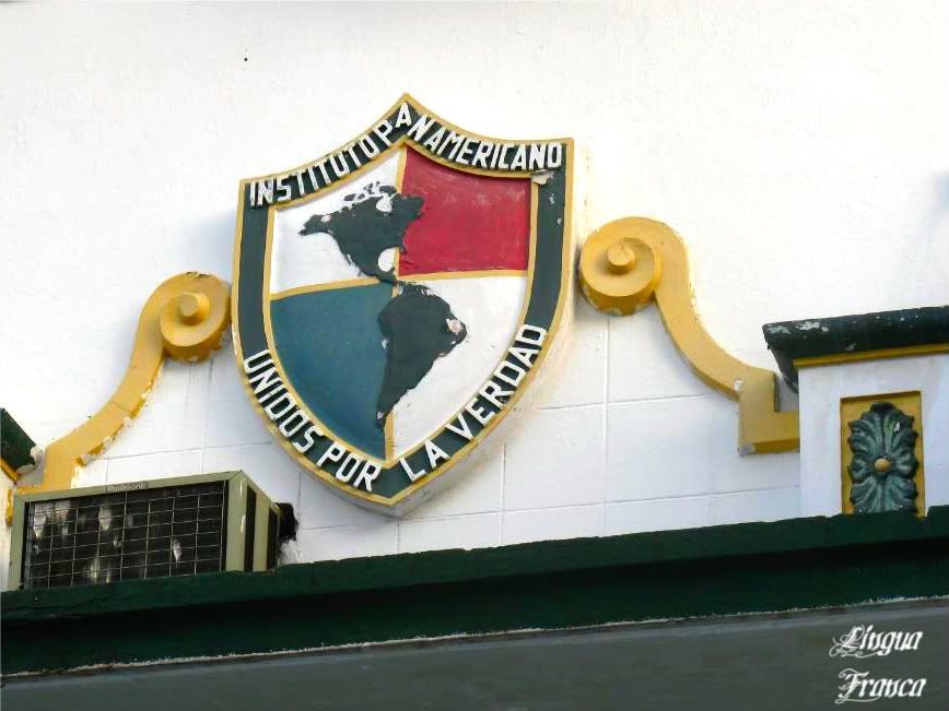 Picture of IPAs logo embedded on a wall of the building. The motto of the school is United by the Truth. (Credit: Omar Upegui R.)