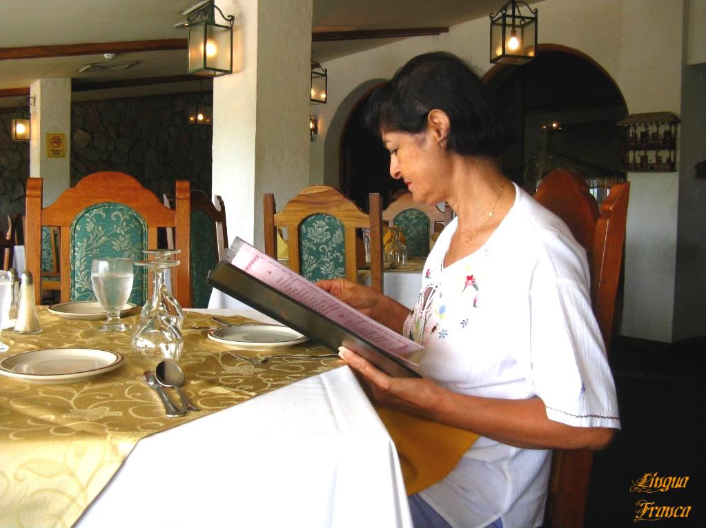 Another picture of Aura glancing at the Menu for the next time we return. (Credit: Omar Upegui R.)