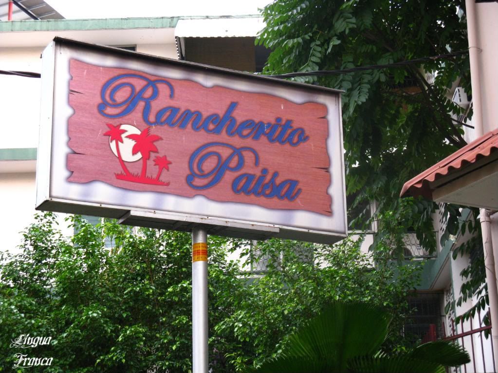 A closer view of the sign of the restaurant with lush tropical vegetation on the background. As you have probably noticed, Panama City is a very green city. (Credit: Omar Upegui R.)