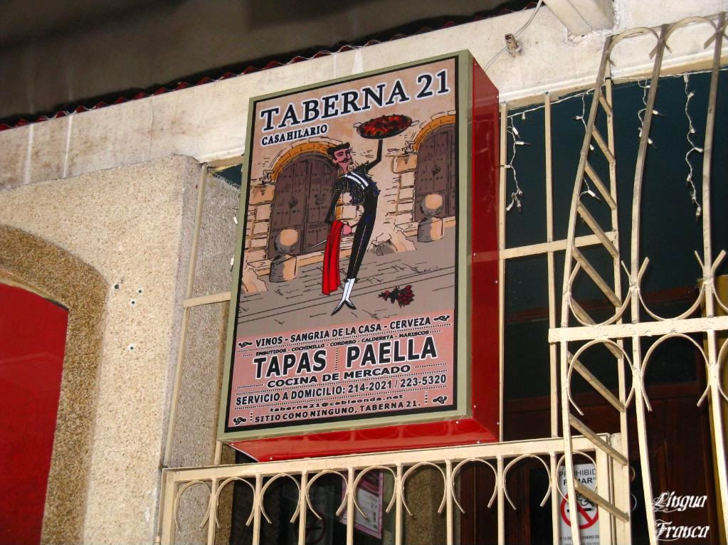 Photograph of the sign of Taberna XXI Restaurant located at Via Argentina in Panama City, Panama. (Credit: Omar Upegui R.)