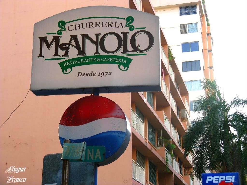 Another view of Churrería Manolos sign at Via Argentina in Panama City, Panama. (Credit: Omar Upegui R.)