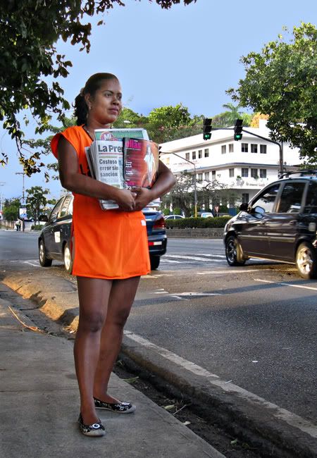 The face of one of the thousands of street workers in Panama who work below the traffic lights.